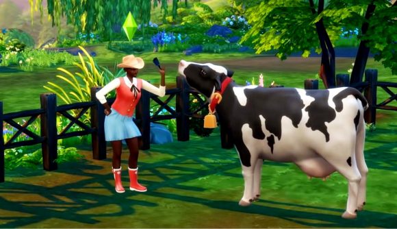 Sims 4 cheats: A female sim waves a cow bell at a cow