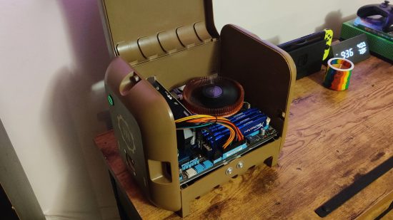 Fallout 4 Pip-Boy gaming PC with the case open, showing the RAM, CPU cooler, and other components