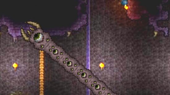 All Terraria bosses: a giant worm with lots of eyes eating the ground.