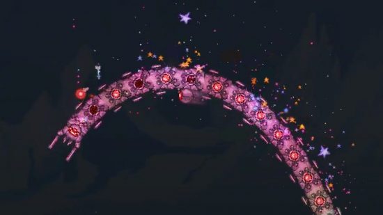 All Terraria bosses: a purple worm with many eyes, being hit by fireworks.