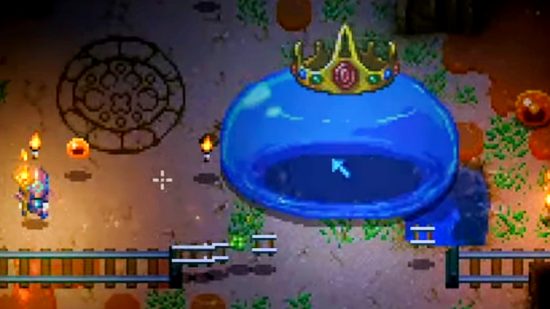 Core Keeper - King Slime, a giant blue blob with a crown, destroying a mine in the sandbox game