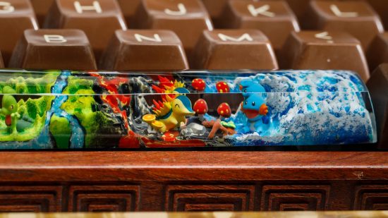 Custom Pokemon space bar with Cyndaquil and Mudkip within