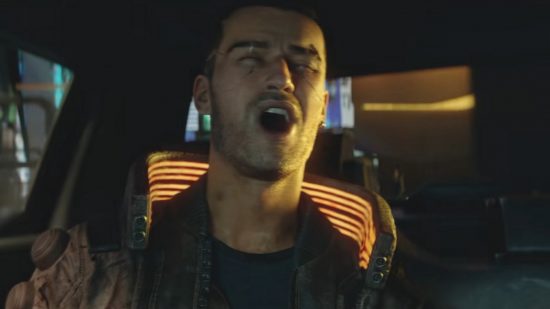 Cyberpunk 2077 mods: A white man in dark clothing is shouting happily in a car