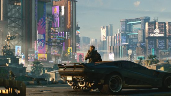 Cyberpunk 2077 sales: V takes a drag off a cigarette as he leans against his high-tech car, looking out over a sun-drenched Night City skyline
