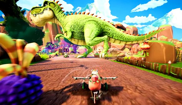 Gigantosaurus: Dino Kart - a tiny dinosaur in a go-kart speeds towards the camera along a dirt track, as a giant green dinosaur strides across the course in the background