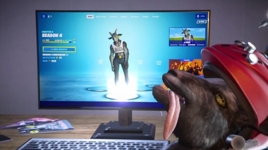 Goat Simulator 3 Fortnite outfit: A goat lies in a chair next to a PC, whose monitor displays a goat-headed humanoid figure in the Fortnite lobby