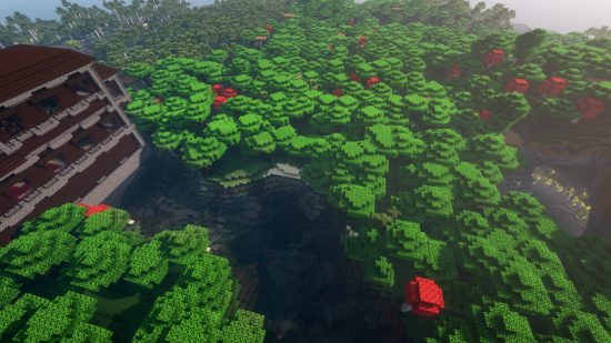 Meilleures graines de Minecraft : un manoir boisé au bord d'une rivière dans Minecraft, en face d'une grotte luxuriante