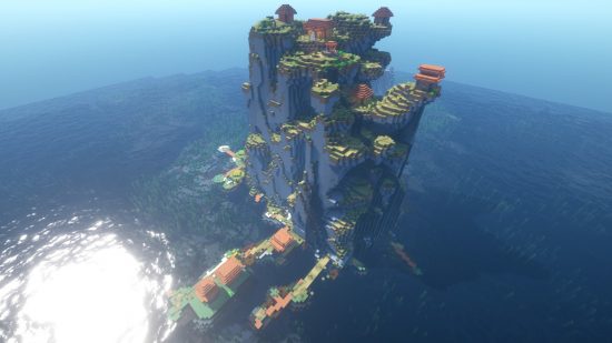 Best Minecraft seeds: a Minecraft 1.18 village built into a tall rocky island.