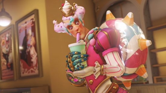 Overwatch 2 McDonalds discover may hint at tasty collab: Anniversary Junfood Junkrat skin sips a soda from a paper cup while looking sheepish
