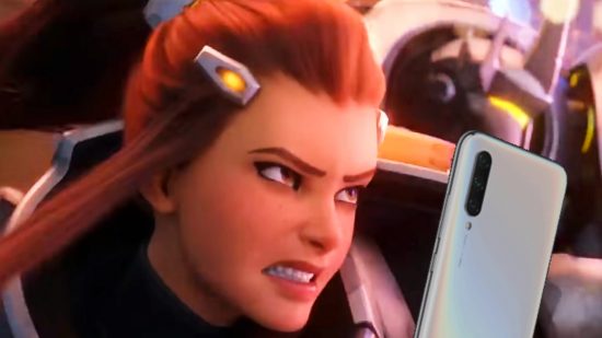 Overwatch 2 phone number verification - Brigitte glares angrily at a mobile phone