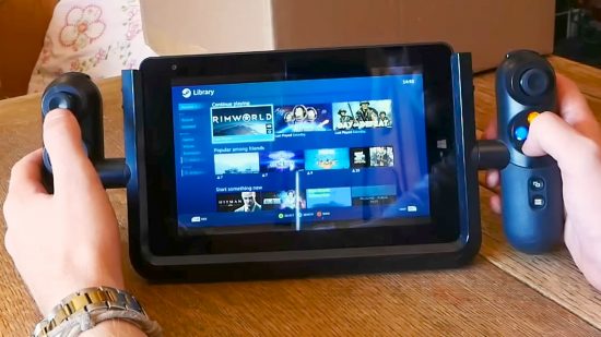 Steam Deck: tablet with controller grips and Steam big picture on screen