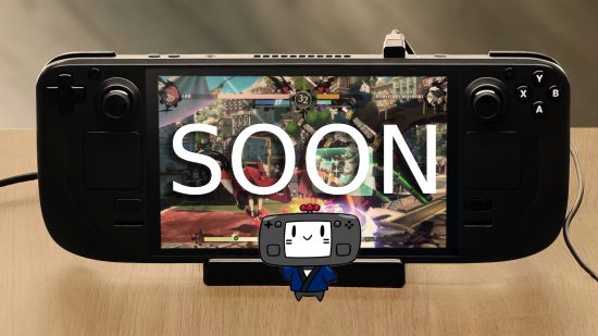 Steam Deck dock with handheld attached and mascot standing infront of screen showing the word "SOON"