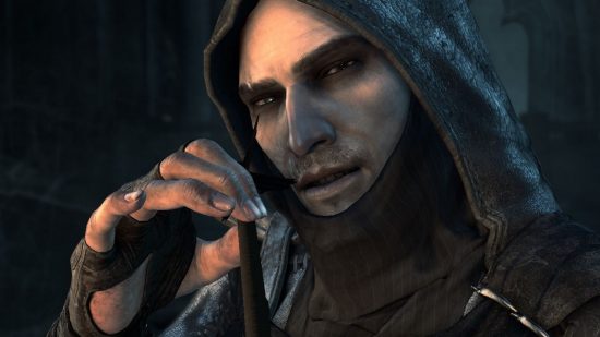 Thief 2 prototype is an enticing look at the action game’s early days: A white man wearing a hood is holding an object in his hand