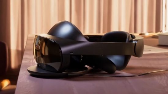 The Meta Quest Pro VR headset sits on a desk with its controllers