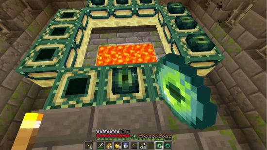 Minecraft End portal - the player is placing an Eye of Ender in the slot to activate the portal.