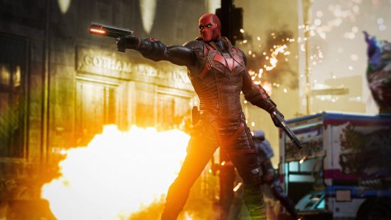 Best Gotham Knight abilities: Red Hood is shooting at a target off-screen. A car behind him is exploding.