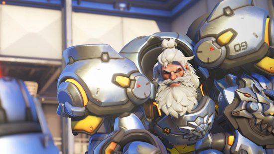 Best Overwatch 2 tank heroes: a white-bearded Reinhardt slams his hammer into the ground