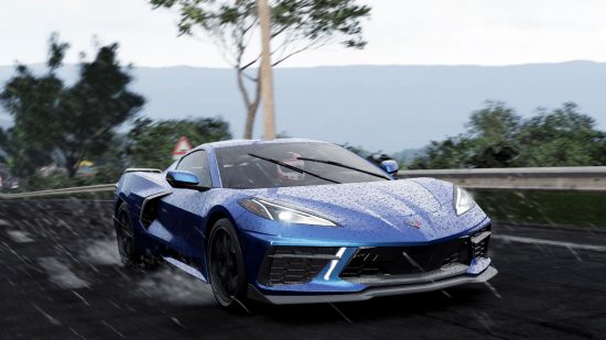 Best PC games: driving a blue sports car through pounding rain in Project Cars 3