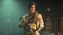 Modern Warfare 2 finishing move: a female operator posing with a gun