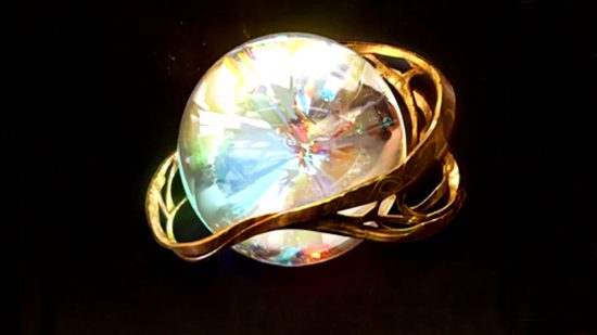 डायब्लो अमर - योग्य दिग्गज रत्नाचा आशीर्वाद, सोन्याच्या नमुन्याच्या अंगठीसह एक पांढरा गोलाकार क्रिस्टल