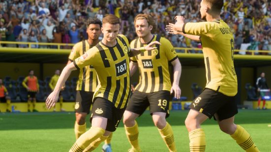 Cheapest 85 rated players in FIFA 23: Marco Reus celebrates with his teammates after scoring a goal