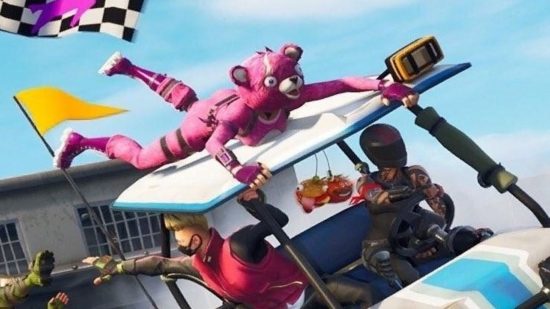 Fortnite Rocket League racing track is a blast, this image shows a character trying to hold onto the top of a car.