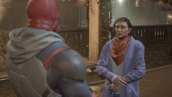 Liste der Gotham Knights Mission: Red Hood spricht mit einer Frau in einem lila Mantel mit einem roten Schal
