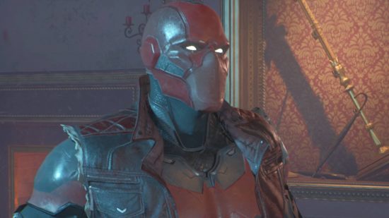 Gotham Knights: Red Hood is wearing his classic costume, with a brown jacket and a mask that has a breathable section for his mouth and nose.