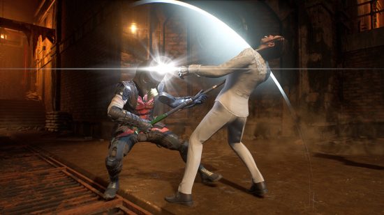 Gotham Knights timed strikes: Robin is landing a timed strike on an enemy wearing a white suit. and a mask in the middle of a chamber..