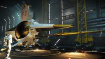 No Man's Sky 4.0 update: An astronaut in white stands in a hangar next to a starship built around a spherical central hull and accented with gold instruments and weapons.
