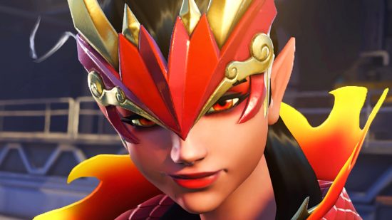Overwatch 2 nerfs for season one - Sombra in her Zhulong outfit (a dragon-inspired red and gold headpiece with flaming collar) smirking wryly at camera