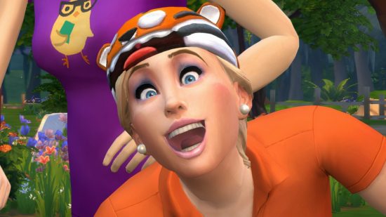 Sims 4 update “bug” is making everything catch fire, even the toilet: a Sim from the free PC game Sims 4