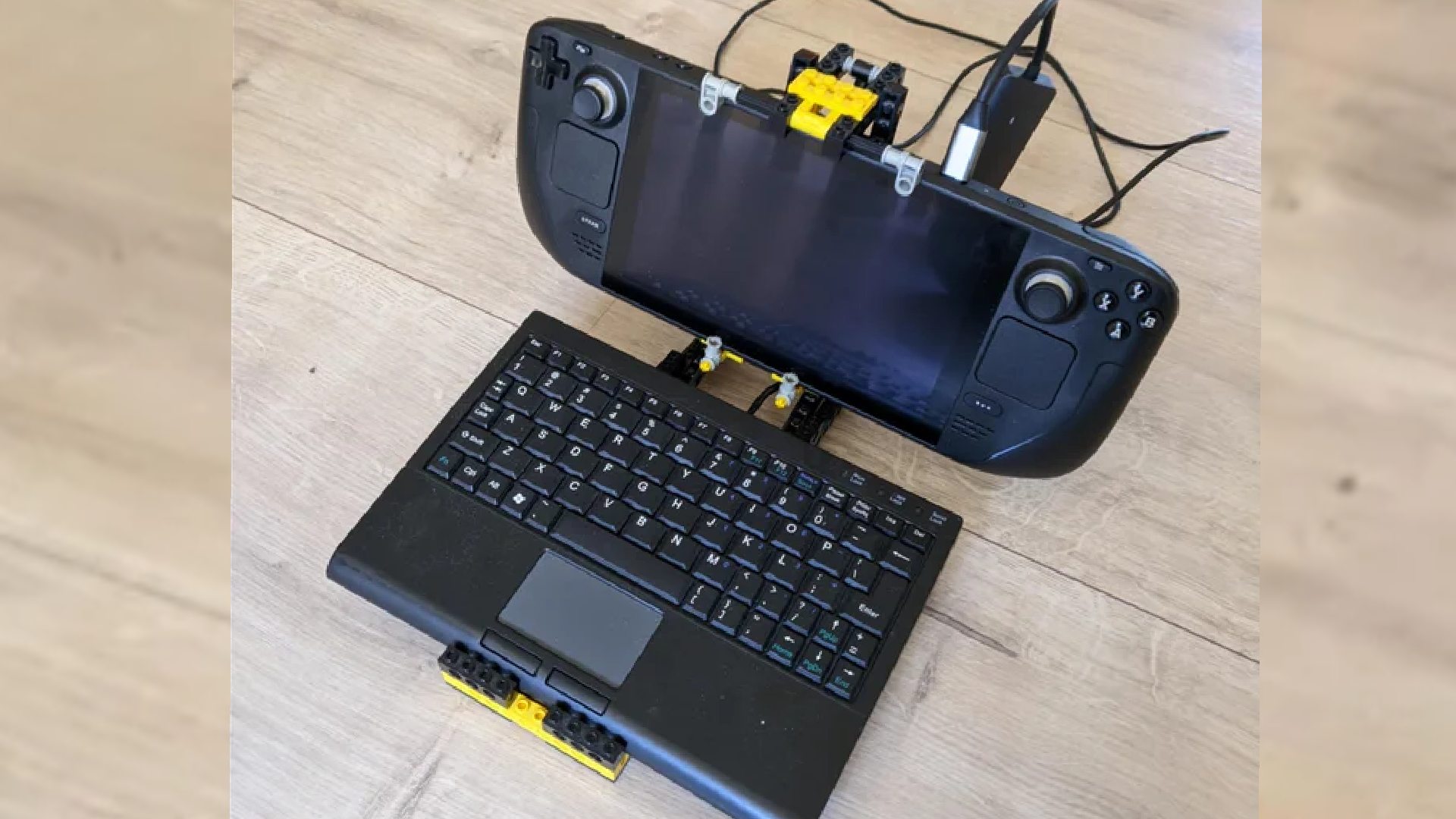 Steam Deck connected to laptop keyboard with Lego stand