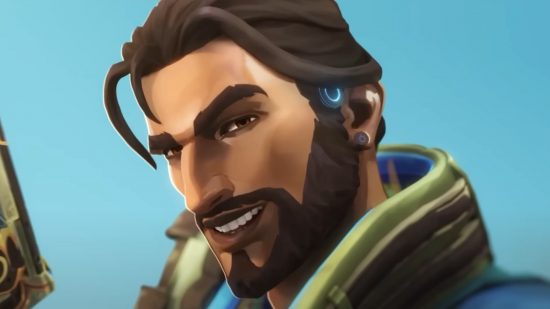 Valorant battle pass episode 5 act 3: A brown haired tanned man with a goatee smirks into the camera charmingly