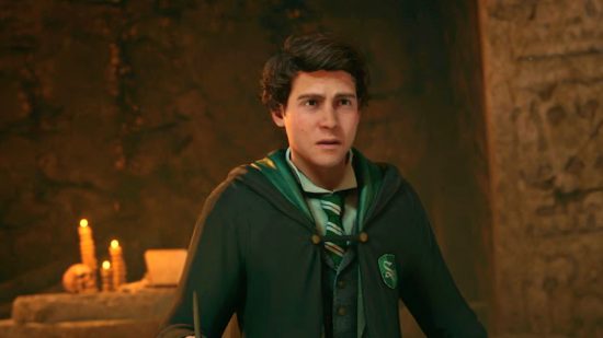 Harry Potter spell Imperio will be usable in Hogwarts Legacy: a student in Slytherin garb in Hogwarts Legacy, getting ready to cast a Harry Potter spell
