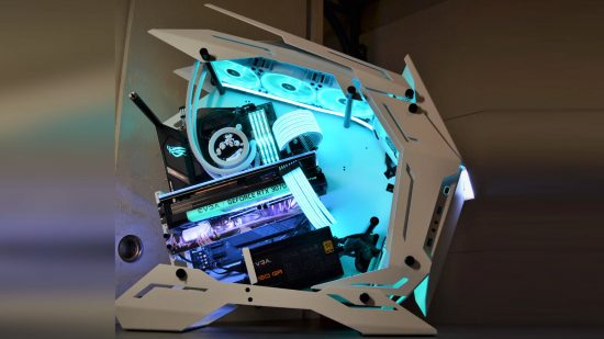 The Jujutsu Kaisen gaming PC shows its interior lit up blue with RGB lighting