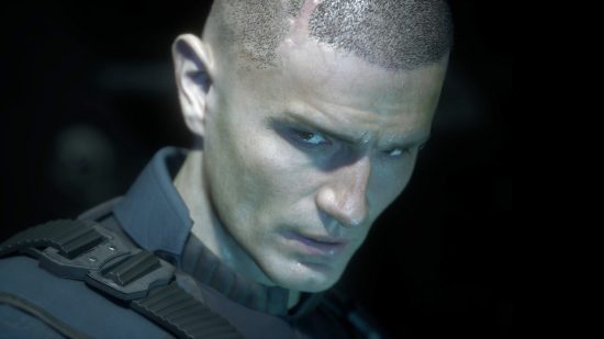 Jacob Lee, protagonist of The Callisto Protocol, looks ominously to the left in a close-up