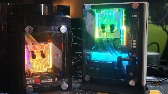 An Xbox One S and PS3 converted into watercooled gaming PCs, both showing RGB lighting through the glass