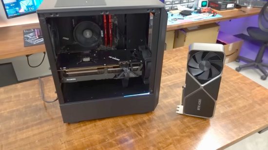 AMD gaming PC next to RTX 4080 on wood surface