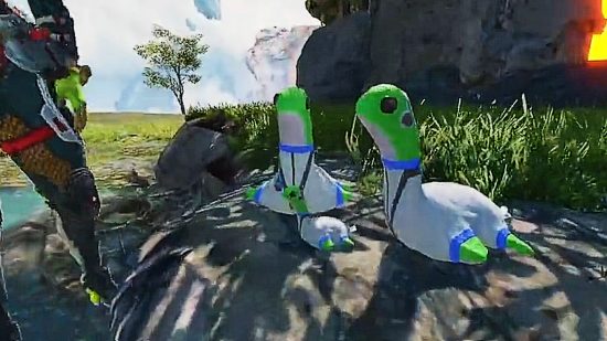 Apex Legends Broken Moon Space Nessies: A family of three Nessie plush toys - two large, one small - sit on a rock in a sunny field with trees swaying in the distance
