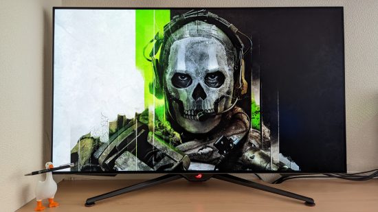 The Asus ROG Swift PG48UQ gaming monitor, displaying a picture of Ghost from Modern Warfare II