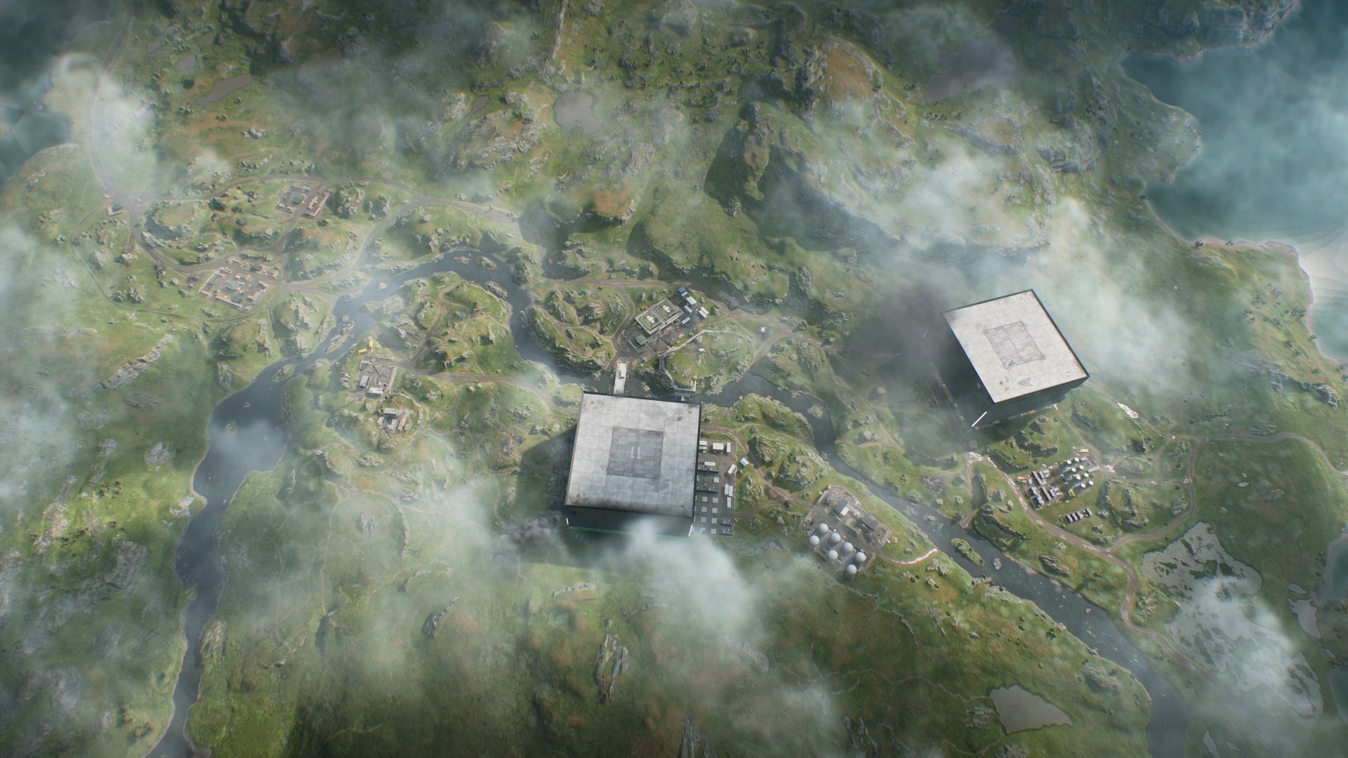 Pratique de la nouvelle carte de Battlefield 2042 Saison 3 : Une vue aérienne de la carte Fer de lance, avec deux grands bâtiments carrés de chaque côté d'un ruisseau qui traverse la campagne rocheuse suédoise