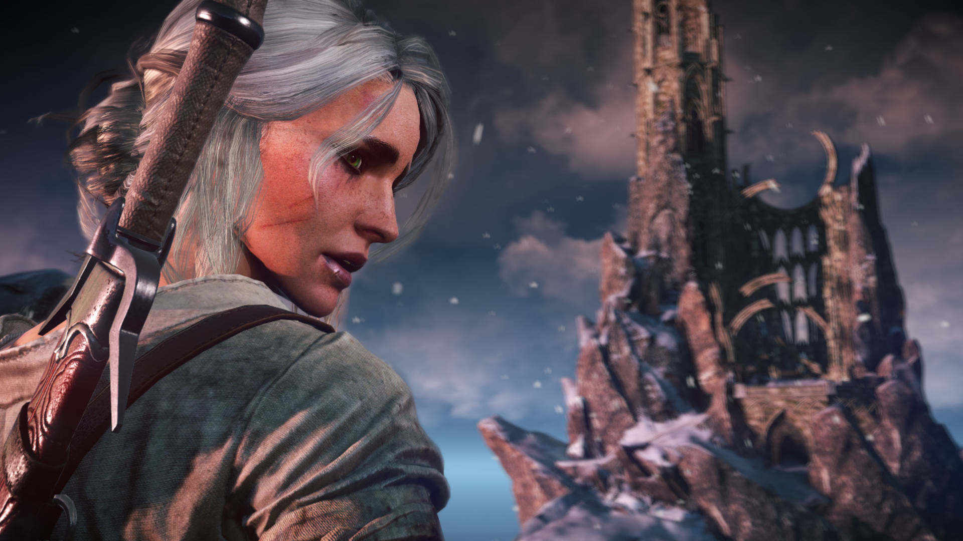 Best RPG games - Ciri from Witcher 3 is standing on a cliff face overlooking a castle on a hill.