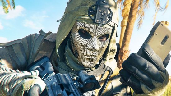 Warzone 2 DMZ missions are like a Far Cry game inside Call of Duty: An operator in Warzone 2, wearing a mask, checks their phone in the battle royale game