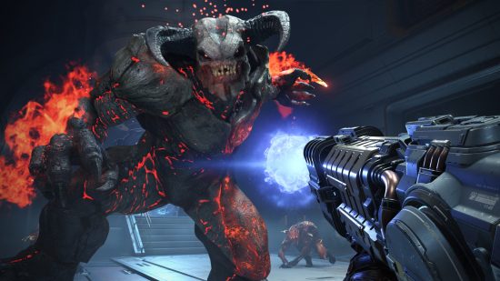 Doom Eternal composer Mick Gordon claims id Software director “lied”: A horned demon snarls as Doomguy attacks with a plasma rifle