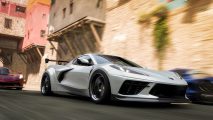 Forza Horizon 5 auction house closed: A white Corvette supercar races along a Mexican street in Forza Horizon 5