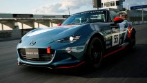 Gran Turismo 7 - a Mazda roadster drives down a racing track