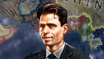 Hearts of Iron 4 - India's P Krishna Pillai, a well-kept man in a black suit and tie, set against the Indian map