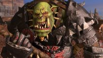 Total War: Warhammer 3 update 2.3.0 patch notes: An orc warboss with a scar across one eye and a broken tusk holding an axe
