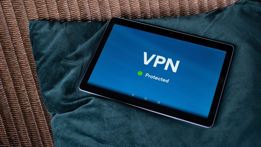A tablet on a cushion that has a VPN on it.